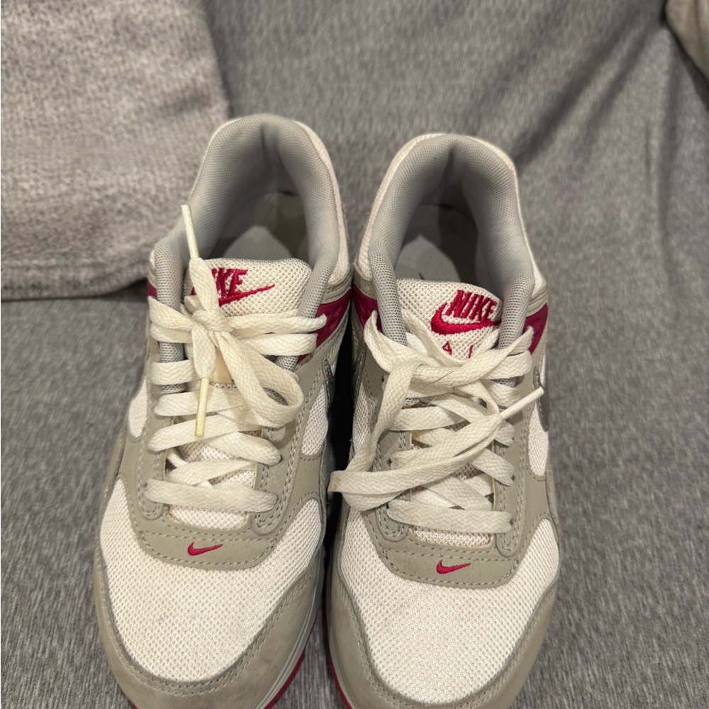 Nike White and Gray Sneakers with Pink Highlights